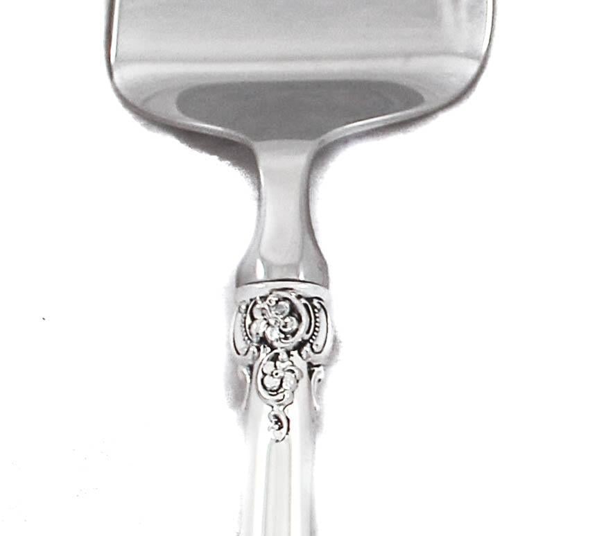 Grande Baroque Sterling Server: Grande Baroque Sterling Server Creator: Wallace Silversmiths (Manufacturer) Dimensions: Height: 11 in (27.94 cm)Diameter: 4 in (10.16 cm) Materials and Techniques: Sterling Silver Place of Origin: Uni