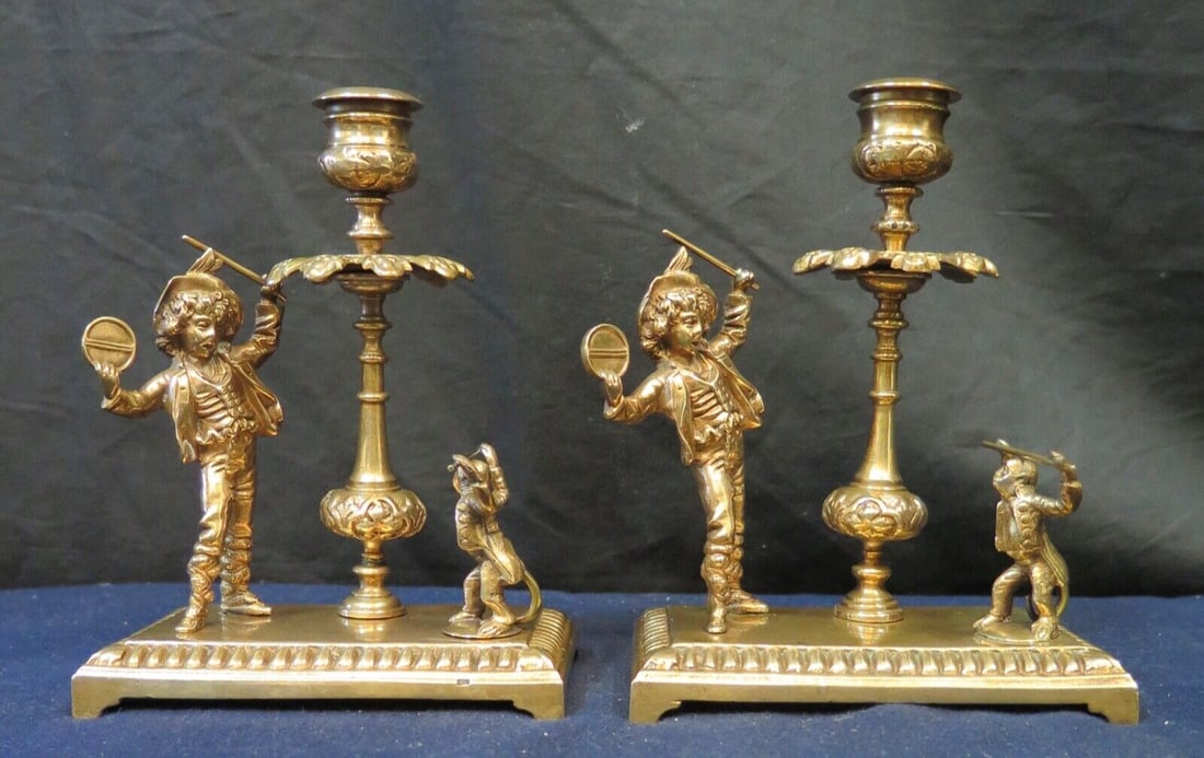 Whimsical Victorian Candleholders: Whimsical Victorian Candleholders Type: Candle Holder Material: Bronze Color: Gold Finish: High Polished Number In Pack: 2 Style: Victorian This whimsical Victorian pair of bronze candleholders are de