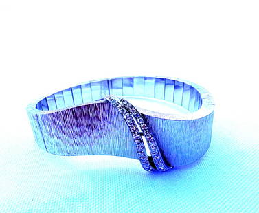FRENCH 18K WHITE GOLD DIAMOND BRACELET: FRENCH 18K WHITE GOLD DIAMOND BRACELET Type: Bracelet Metal Purity: 18k Style: Bangle Metal: White Gold Main Stone: Diamond This is a French 18K white gold diamond bracelet weighing 55.70 grams