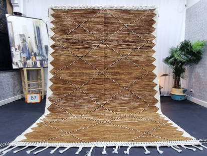 Lovely Brown Rug: Lovely Brown Rug Lovely Authentic Brown Rug handwoven in the Atlas Mountains by local Berber women weavers using traditional tools and natural local wool.Material: 100% local sheep woolCountry of