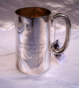 ELIZABETH TAYLOR ENGLISH DUNHILL STERLING SILVER TANKARD: ELIZABETH TAYLOR ENGLISH DUNHILL STERLING SILVER TANKARD Age: 1970 PLEASE NOTE: LOCAL PICK UP IS NOT AN OPTION AND ALL ITEMS IN THIS AUCTION MUST BE SHIPPED. We offer Free Shipping for rugs that are s