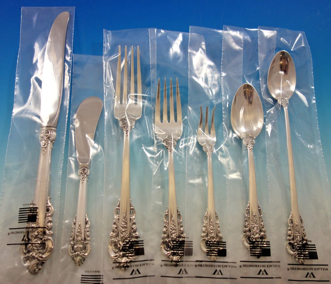Grande Baroque by Wallace Sterling Silver Flatware Set Service 70 pc Dinner New: Grande Baroque by Wallace Sterling Silver Flatware Set Service 70 pc Dinner New Styled in the lavish baroque manner, this highly collectible pattern is our best seller. Introduced in 1941, it captures