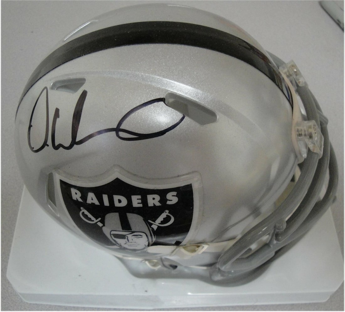 DeAndre Washington Hand Signed Auto Mini Helmet Oakland Raiders JSA WP: DeAndre Washington Hand Signed Auto Mini Helmet Oakland Raiders JSA WP Sport: Football Product: Helmet Original/Reprint: Original Player: DeAndre Washington Team: Oakland Raiders Autograph Authenticat