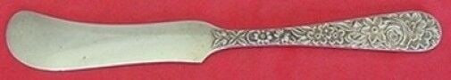 Repousse by Kirk Sterling Silver Butter Spreader Pattern on Both Sides FH 5 1/2": Repousse by Kirk Sterling Silver Butter Spreader Pattern on Both Sides FH 5 1/2" Repousse by kirksterling silver flat handle butter spreader with pattern on both sides of handle, 5 1/2" in the pattern
