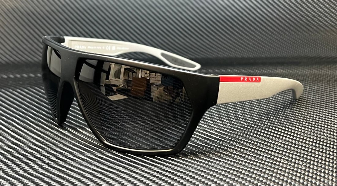 PRADA LINEA ROSSA PS 08US 4535W1 Matte Black Grey Polarized Mens 67 mm Sunglass: PRADA LINEA ROSSA PS 08US 4535W1 Matte Black Grey Polarized Mens 67 mm Sunglass Lens Technology: Gradient Polarized Frame Color: Black Uv Protection: UV400 Type: Sunglasses Lens Material: Plastic Styl