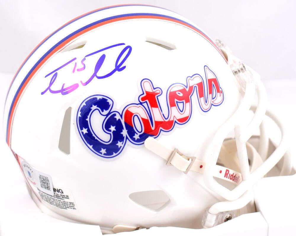 Tim Tebow Autographed Gators Stars & Stripes Speed Mini Helmet - Beckett W Holo: Tim Tebow Autographed Gators Stars & Stripes Speed Mini Helmet - Beckett W Holo Sport: Football-NCAA Product: Helmet Original/Reprint: Original Player: Tim Tebow Team: Florida Gators Autograph Authent