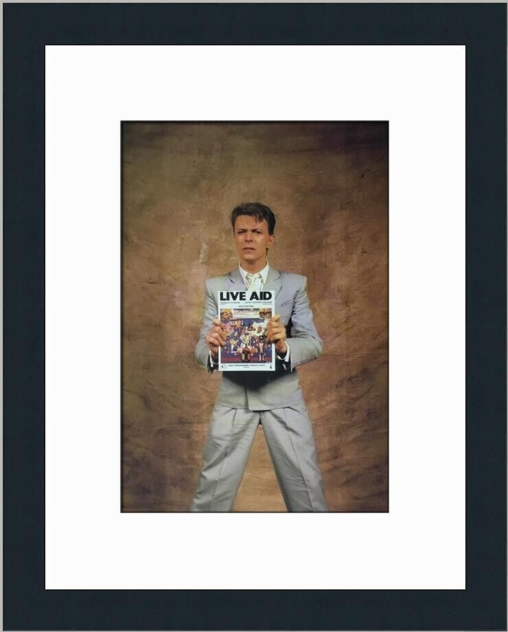 David Bowie Live Aid Concert Custom Framed Print: David Bowie Live Aid Concert Custom Framed Print Industry: Music Image Size 10 x 7 Custom Framed Size 16 x 13 Off Set Open Edition Print Custom Framed in a 1 Flat Black Frame Single 8-ply Outer Mat Al