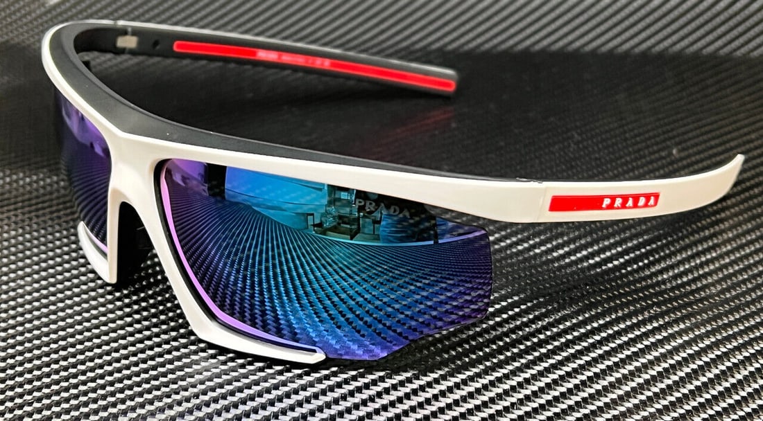 PRADA LINEA ROSSA PS 07YS 15K08R White Rubber Mens 76 mm Sunglasses: PRADA LINEA ROSSA PS 07YS 15K08R White Rubber Mens 76 mm Sunglasses Frame Color: White Type: Sunglasses New The MYNT Guarantee: All items in this auction are guaranteed to be 100% authentic. At Your S