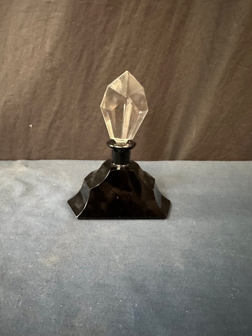 czech art deco perfume bottle vintage: czech art deco perfume bottle vintage Type: Bottle Handmade: No This vintage early 20th century Art Deco vanity perfume bottle is designed in Czechoslovakian black glass accented with a faceted crysta