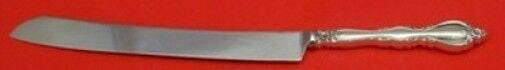 Grande Regency by International Sterling Silver Wedding Cake Knife HHWS  Custom: Grande Regency by International Sterling Silver Wedding Cake Knife HHWS Custom This vibrant pattern features symmetrical lines that sweep the length of the handle and gently curve at the top. It's per