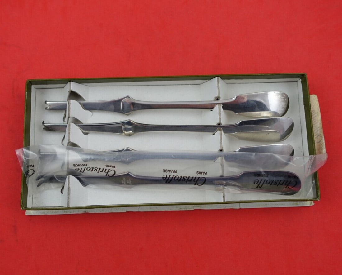 Cluny by Christofle Silverplate Lobster Pick Set 4pc in Original Box Never Used: Cluny by Christofle Silverplate Lobster Pick Set 4pc in Original Box Never Used Cluny by christoflesilverplate lobster pick set 4-piece 7 1/8" in the pattern cluny by christofle. This set has never be