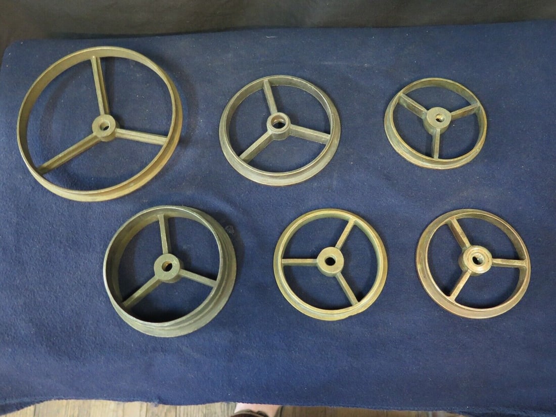 Tiffany Studios Lamp Wheels: Tiffany Studios Lamp Wheels Type: lamp base wheels This vintage early 1900's assortment of authentic Tiffany Studios New York bronze wheels can accommodate various shades.There are six wheels in this 