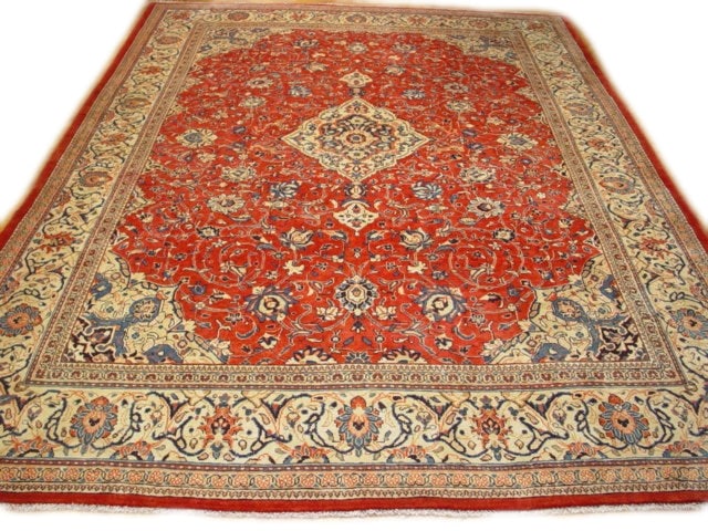 10 x 13 Red Semi Antique Persian Sarouk Rug: 10 x 13 Red Semi Antique Persian Sarouk Rug Free continental US Shipping Size in Feet: Width: 10 x Length: 13 Size in Inches: Width: 120 in x Length: 156 in Colors: Red Ivory Weave: 100% Handmade Pile