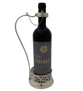 FINE 925 STERLING SILVER HANDMADE CUT OUT LEAF CHASED ORNATE BOTTLE HOLDER: FINE 925 STERLING SILVER HANDMADE CUT OUT LEAF CHASED ORNATE BOTTLE HOLDER Fine 925 Sterling Silver Bottle Holder. Featuring handmade cut out leaf chased ornate designs. Silver Weight: 335 Grams 