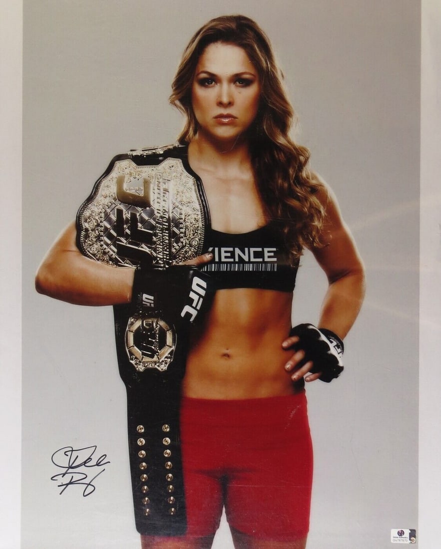 Rhonda Rousey Autographed 16X20 Photo UFC Champ Holding Belt: Rhonda Rousey Autographed 16X20 Photo UFC Champ Holding Belt Sport: Mixed Martial Arts (MMA) Original/Reprint: Original Product: Memorabilia League: MLB Player: Rhonda Rousey Autograph Authentication: