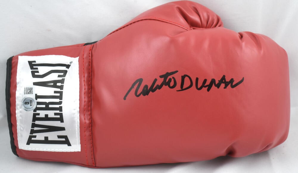 Roberto Duran Autographed Red Everlast Boxing Glove *Right - Beckett W Hologram: Roberto Duran Autographed Red Everlast Boxing Glove *Right - Beckett W Hologram Sport: Boxing Product: Glove Original/Reprint: Original Player: Roberto Duran Autograph Authentication: Beckett Authenti