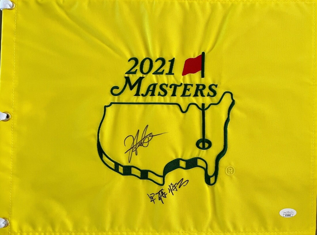 Hideki Matsuyama/Shota Hayafuji signed 2021 Masters Pin Flag-JSA AF18965: Hideki Matsuyama/Shota Hayafuji signed 2021 Masters Pin Flag-JSA AF18965 Player: Hideki Matsuyama and Shota Hayafuji Sport: Golf-PGA Signed: Yes Autograph Authentication: James Spence Authentication (