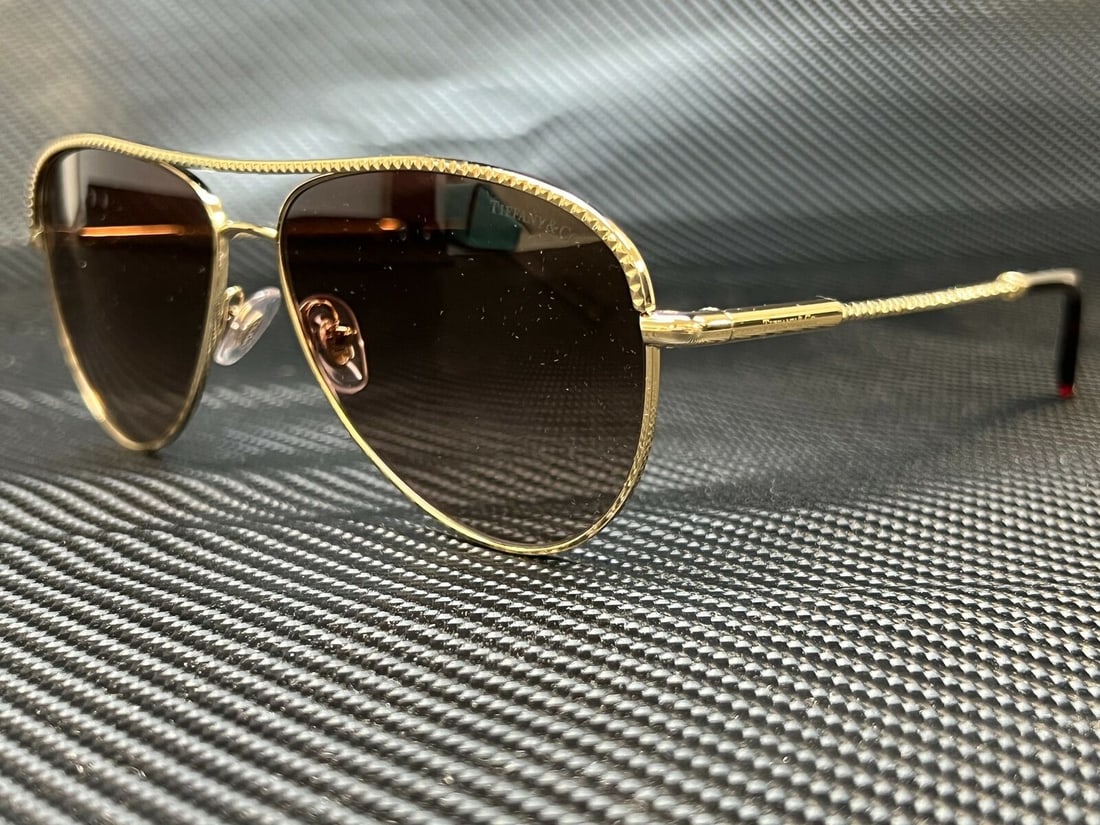 TIFFANY TF3062 60213B Gold Brown Gradient Womens Sunglasses 57 mm: TIFFANY TF3062 60213B Gold Brown Gradient Womens Sunglasses 57 mm Type: Sunglasses Frame Color: Gold New The Mynt Guarantee: All items in this auction are guaranteed to be 100% authentic. At Your Serv