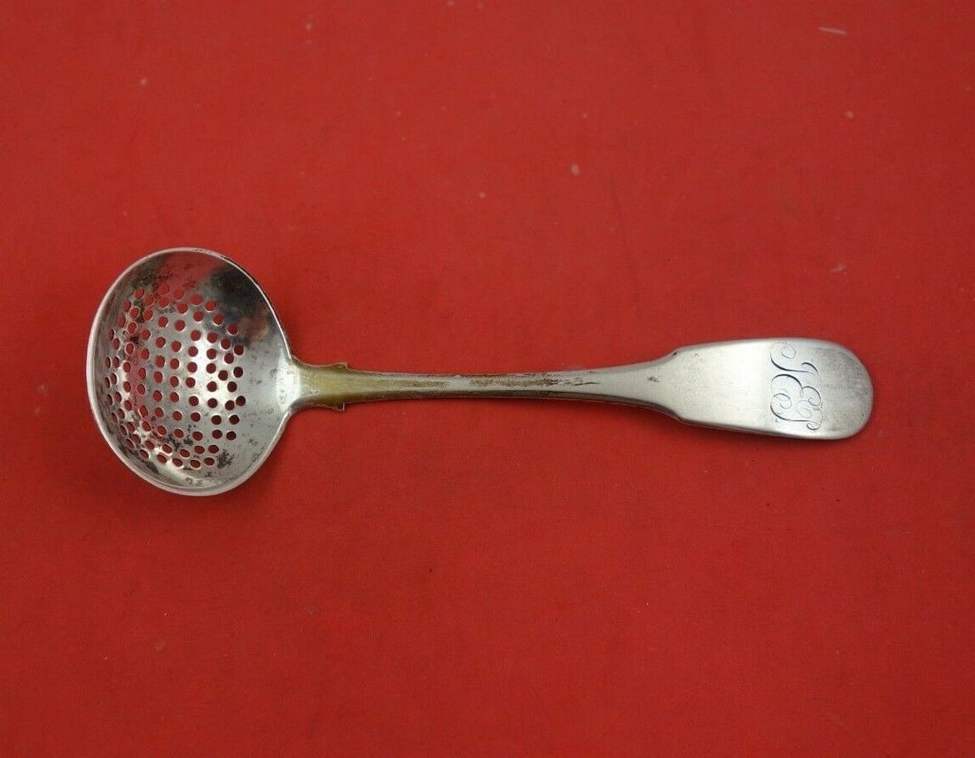 John Ward Coin Silver Sugar Sifter Ladle 1830 6 1/4 inches Heirloom: Tipt by John Ward Coin Silver Sugar Sifter Ladle circa 1830 6 1/4" Heirloom Tipt by john wardcoin silver sugar sifter ladle 6 1/4" in the pattern tipt by john ward. This piece is circa 1830. It is mon