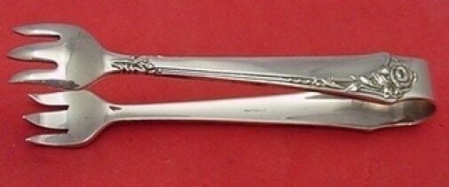 Damask Rose Oneida Sterling Silver Sugar Tong 3 5/8 inches Serving: Damask Rose by Oneida Sterling Silver Sugar Tong 3 5/8" Serving Silverware Damask rose by oneidasterling silver sugar tong, 3 5/8" in the pattern damask rose by oneida. It is not monogrammed and is in