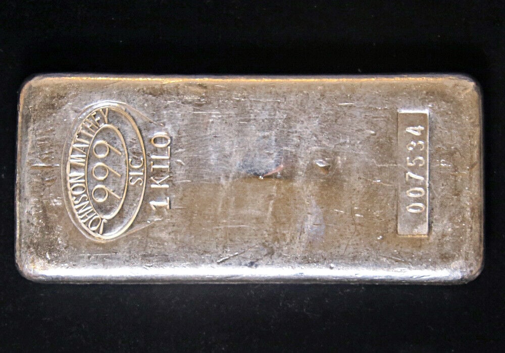 1 Kilo (32.15 Ounce) Silver Bar - Johnson Matthey w/ Serial # - .999 Fine STOCK: 1 Kilo (32.15 Ounce) Silver Bar - Johnson Matthey w/ Serial # - .999 Fine STOCK Composition: Silver Year: None Fineness: 0.999 Pre-Owned The MYNT Guarantee: All items in this auction are guaranteed to