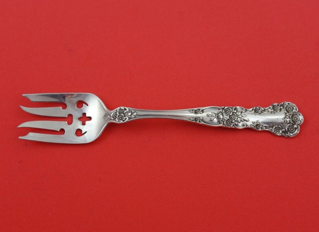 Buttercup by Gorham Sterling Silver Ramekin Fork 5 1/4 inches Extra Piercing: Buttercup by Gorham Sterling Silver Ramekin Fork Wider w/Extra Piercing Original Intricately carved floral motifs carefully arranged along the handle and by the neck of this fanciful pattern are balan