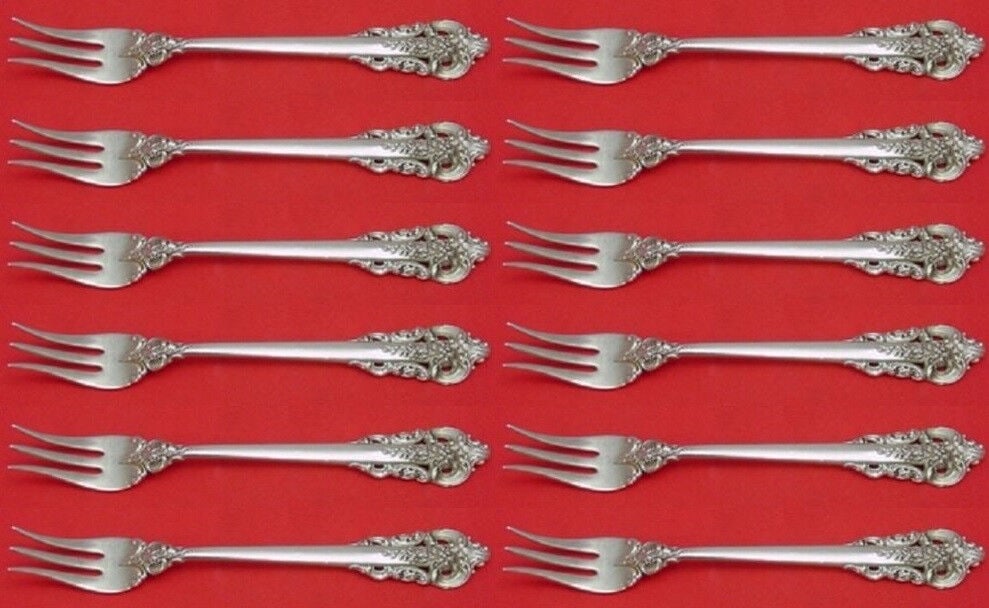 Grande Baroque Sterling Silver Cocktail Fork Set 12 piece by Wallace: Grande Baroque by Wallace Sterling Silver Cocktail Fork Set 12 piece Grande baroque by wallacesterling silver set of 12 cocktail forks, 5 1/4" in the pattern grande baroque by wallace. They are not mo