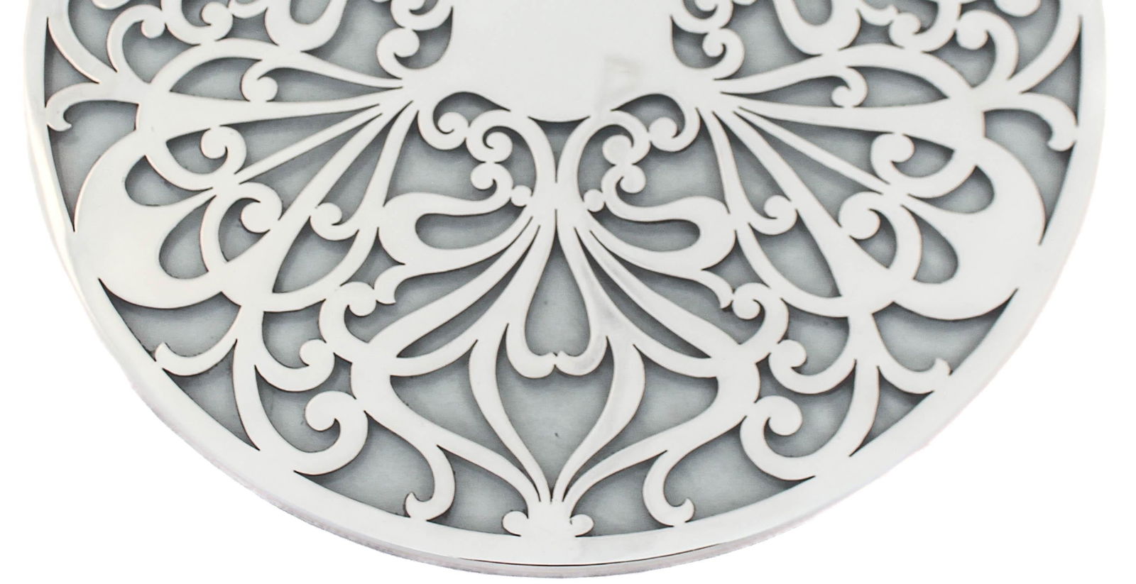 Sterling Silver Tiffany Trivet: Sterling Silver Tiffany Trivet Creator: Tiffany & Co. (Manufacturer) Dimensions: Height: 1 in (2.54 cm)Width: 12 in (30.48 cm)Depth: 12 in (30.48 cm) Materials and Techniques: Sterling Silver Place of