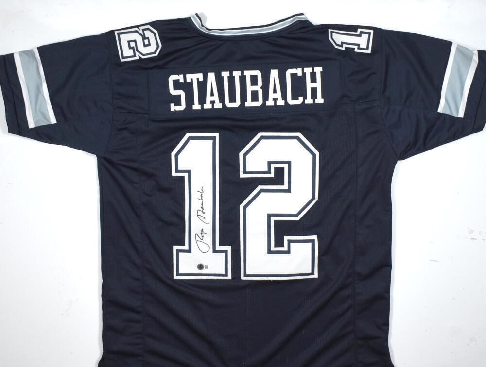 Roger Staubach Autographed Blue Pro Style Jersey-Beckett W Hologram *Black: Roger Staubach Autographed Blue Pro Style Jersey-Beckett W Hologram *Black Sport: Football Product: Jersey Original/Reprint: Original Player: Roger Staubach Team: Dallas Cowboys Autograph Authenticati