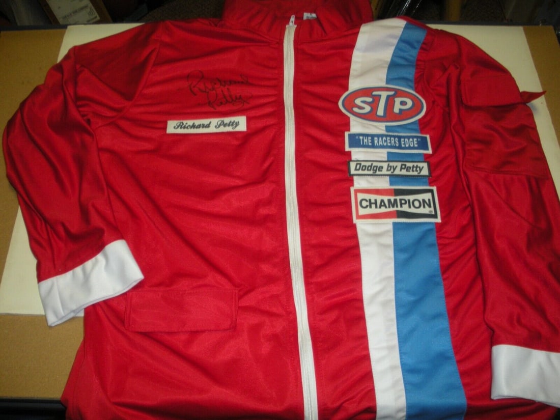 RICHARD PETTY THE KING NASCAR CHAMP RED W/COA SIGNED RACING JACKET: RICHARD PETTY THE KING NASCAR CHAMP RED W/COA SIGNED RACING JACKET Sport: Racing-NASCAR Original/Reprint: Original Product: FLAG Pre-Owned While the lot images are representative of the item, the size