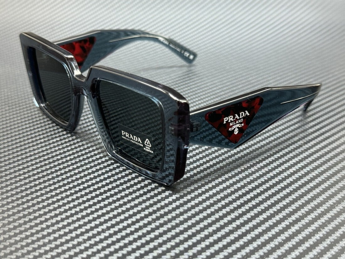 PRADA PR 23YS 19O70B Transparent Graphite Grey Womens 51 mm Sunglasses: PRADA PR 23YS 19O70B Transparent Graphite Grey Womens 51 mm Sunglasses Frame Color: Transparent Graphite Type: Sunglasses New The Mynt Guarantee: All items in this auction are guaranteed to be 100% au