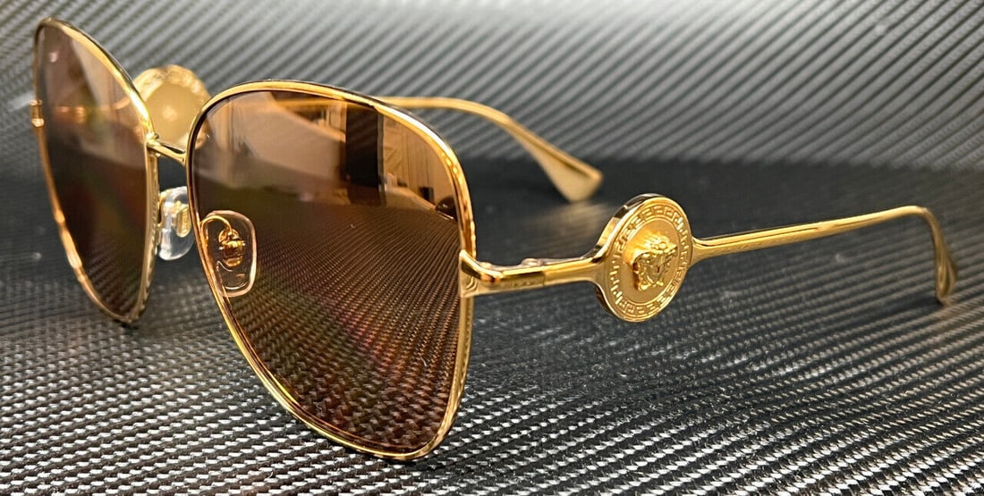 VERSACE VE2256 10027D Gold Light Brown Womens 60 mm Sunglasses: VERSACE VE2256 10027D Gold Light Brown Womens 60 mm Sunglasses Frame Color: Brown Type: Sunglasses New The Mynt Guarantee: All items in this auction are guaranteed to be 100% authentic. At Your Servic