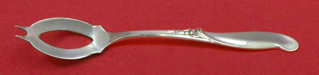 Silver Melody Sterling Silver Olive Spoon 5 3/4in Custom By International: Silver Melody by International Sterling Silver Olive Spoon Ideal 5 3/4" Custom Pattern: Silver Melody Brand: International Type: Serving Spoon Age: Post-1940 Composition: Sterling Silver Maker: Intern