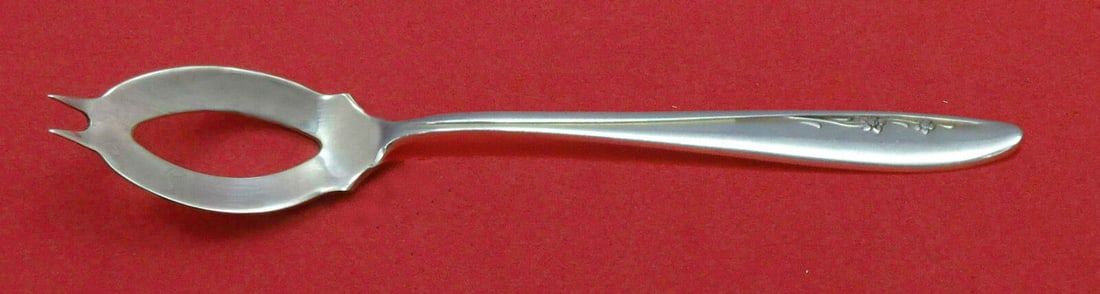 Spring Serenade Sterling Silver Olive Spoon 5 3/4 inches Custom Made by Lunt: Spring Serenade by Lunt Sterling Silver Olive Spoon Ideal 5 3/4" Custom Made Pattern: Spring Serenade Brand: Lunt Type: Serving Spoon Age: Post-1940 Composition: Sterling Silver Maker: Lunt Spring ser