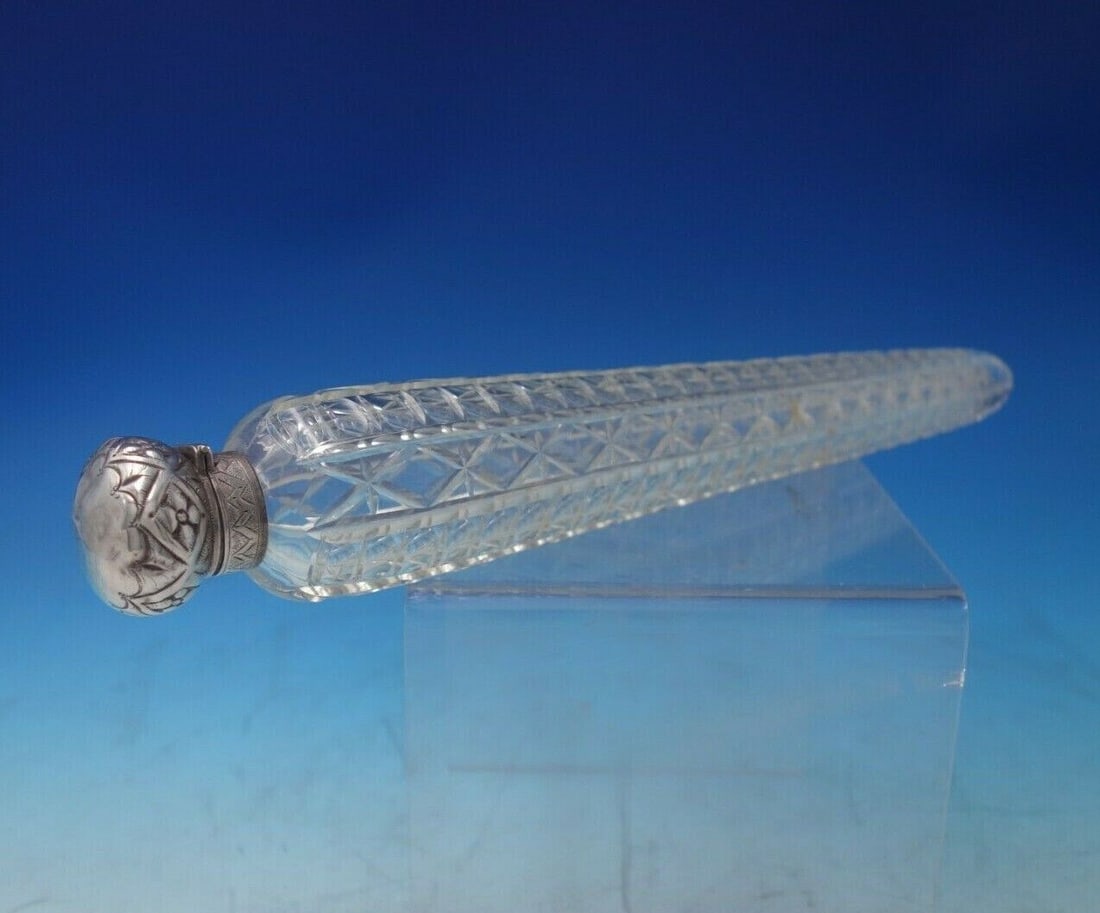 English Sterling Silver Perfume Flask with Cut Crystal 11 3/4 inches: English Sterling Silver Perfume Flask with Cut Crystal 11 3/4" Composition: Sterling Silver Material: Silver Region: United Kingdom Type: Flask Beautiful english cut crystal perfume flask with sterlin
