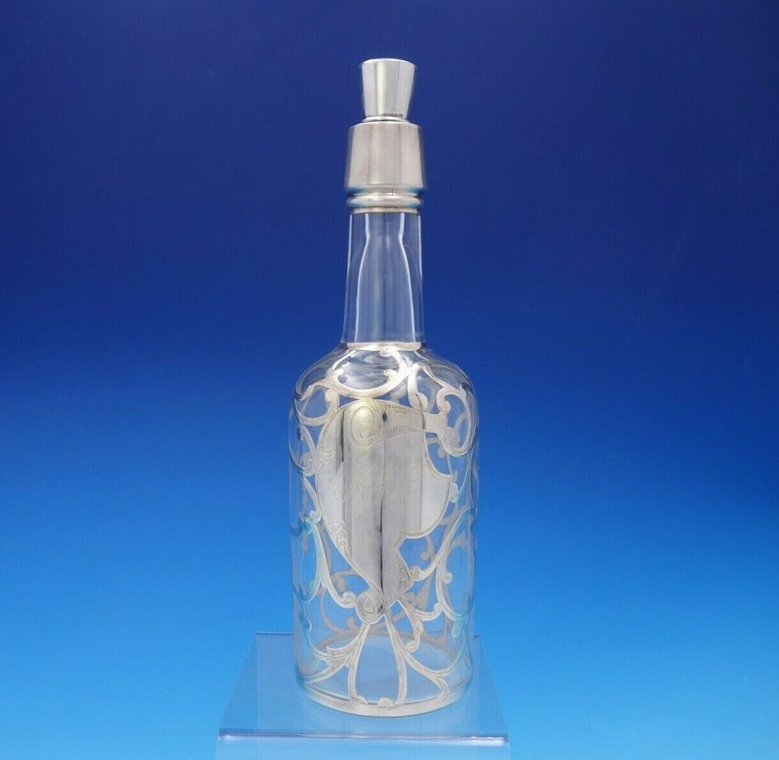 Sterling Silver Overlay Glass Liquor Bottle 10.5in Tall x 3.25in: Sterling Silver Overlay Glass Liquor Bottle 10 1/2" Tall x 3 1/4" Seller Notes: "Excellent condition" Composition: Sterling Silver / Glass Type: Bottles Decanters & Flasks Pretty sterling silver overl