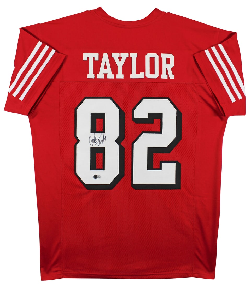 John Taylor Signed Red Pro Style Jersey with Dropshadow BAS Witnessed: John Taylor Signed Red Pro Style Jersey w/ Dropshadow BAS Witnessed Sport: Football Product: Jersey Original/Reprint: Original Player: John Taylor Team: San Francisco 49ers Autograph Authentication: B