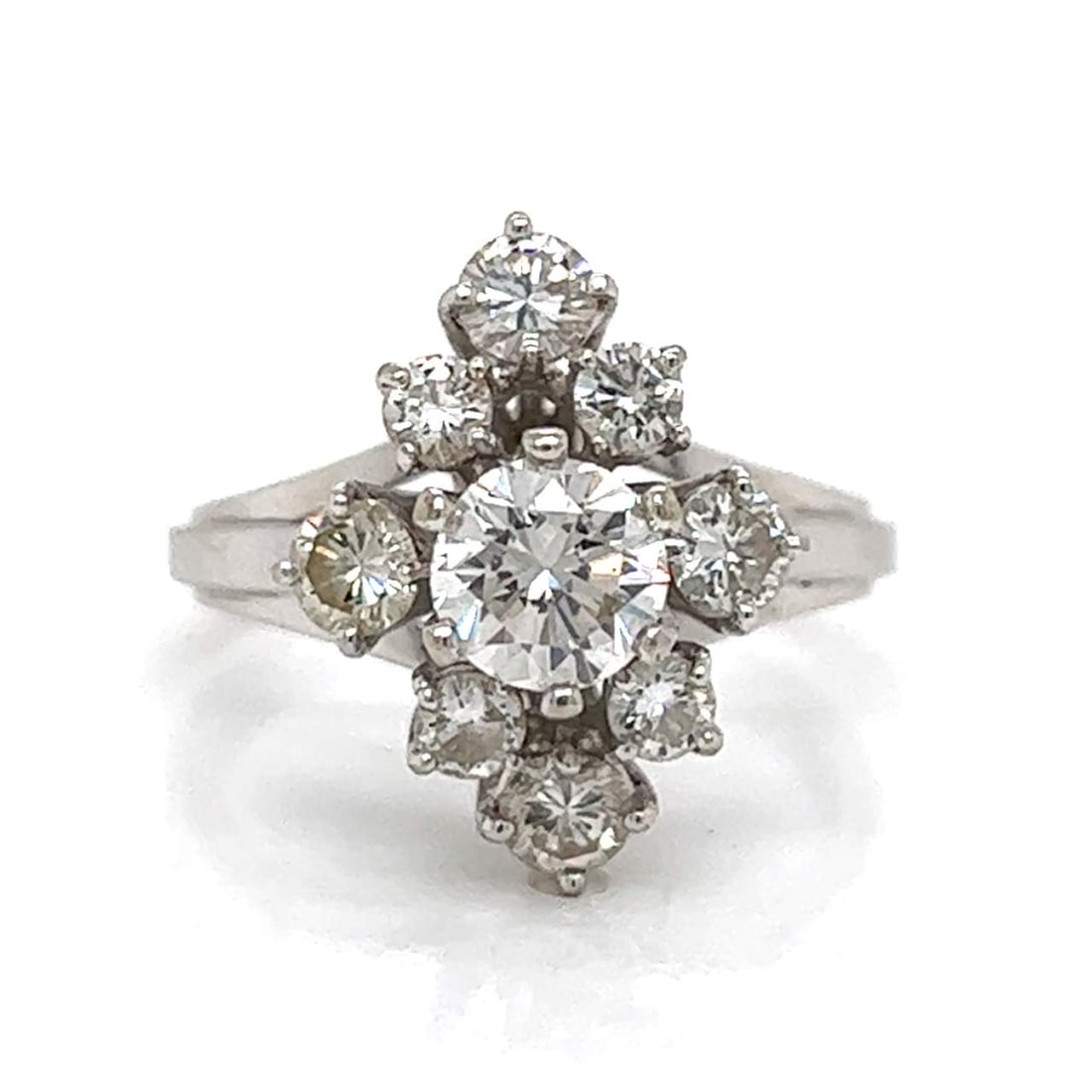 18K White Gold Diamond Ring 1.55 Ct. with Center Stone and 8 Side Diamonds: 18K White Gold 1.55 Ct. Diamond Ring Stone Type: Diamonds Metal Type: 18K Metal Color: White Appraisal Price: $5100 Comments: 18K White Gold 1.55 Ct. Diamond Ring Weighing 5.8 grams Set with an app. 0
