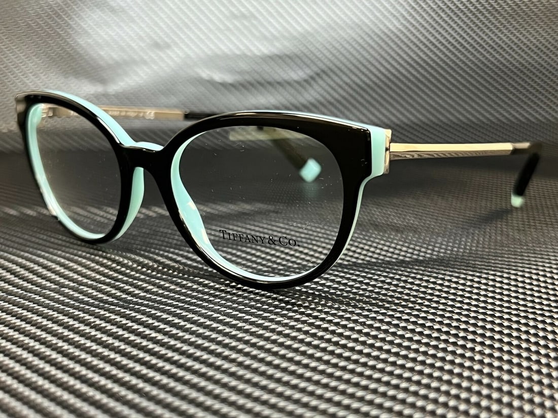 Tiffany Black Oval Eyeglasses 51mm Acetate Full Rim: TIFFANY TF2191 8055 Black Demo Lens Womens Eyeglasses 51 mm Frame Color: Black Type: Eyeglasses Style: Oval Lens Socket Width: 51 mm Frame Material: Acetate Features: Full Rim Bridge Width: 18 mm Temp