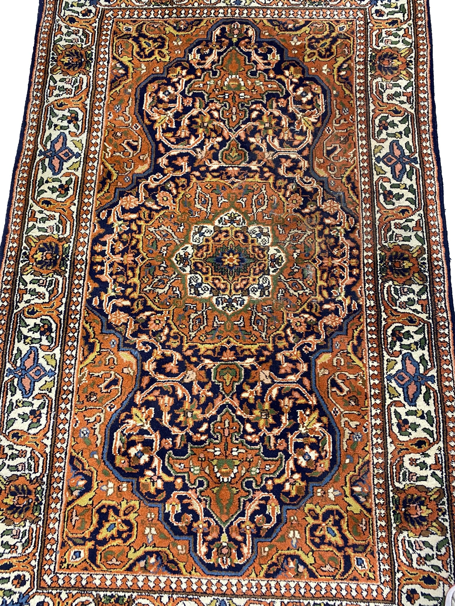 3 x 5 Persian Zanjan Hand-Knotted Wool Rug: This exquisite 3 x 5 Persian Zanjan rug is a stunning area rug, hand-knotted in Iran. Featuring a traditional pattern, it showcases beautiful colors of blue, ivory, and rust. Made from high-quality wo
