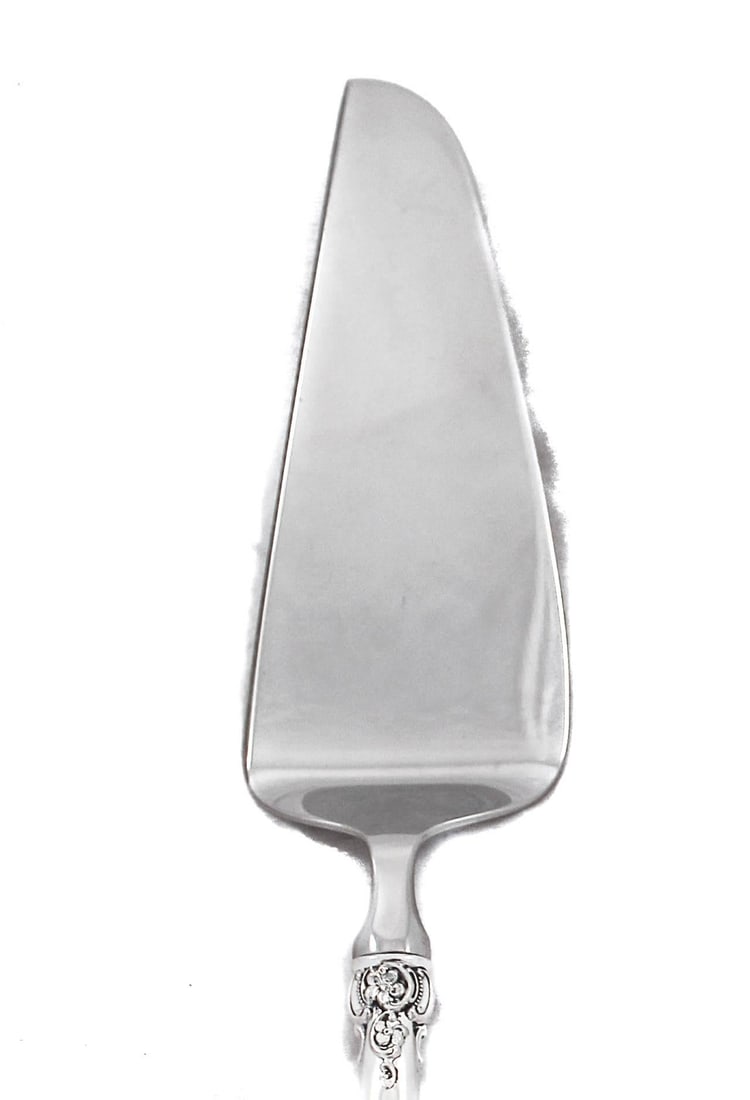 Grande Baroque Sterling Silver Server by Wallace: The Grande Baroque Sterling Silver Server by Wallace Silversmiths is an exquisite piece from the 1940s, showcasing remarkable craftsmanship. Made from sterling silver, this server features a height of