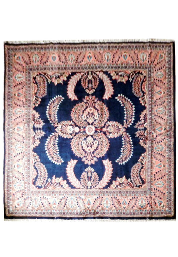 Navy Blue Lilihan Sarouk Rug 7 x 7: This exquisite 7 x 7 Persian Lilihan Sarouk Rug is a stunning addition to any space. Featuring a rich navy blue and light orange color palette, it is expertly handcrafted from 100% wool with a 3/8 pil
