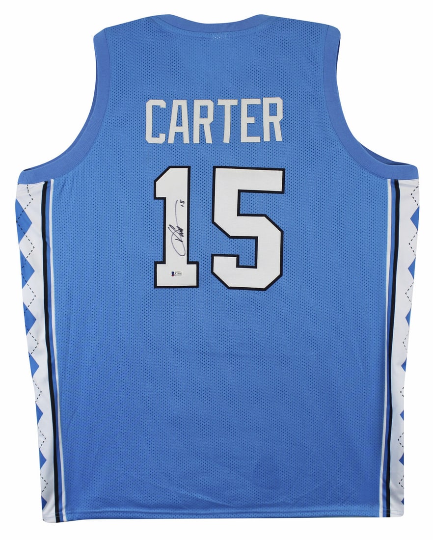 North Carolina Vince Carter Signed Blue jersey BAS Witnessed #K19041: North Carolina Vince Carter Signed Blue jersey BAS Witnessed #K19041 Sport: Football Original/Reprint: Original Team: North Carolina Tar Heels Player: Vince Carter Autograph Authentication: Beckett Pr