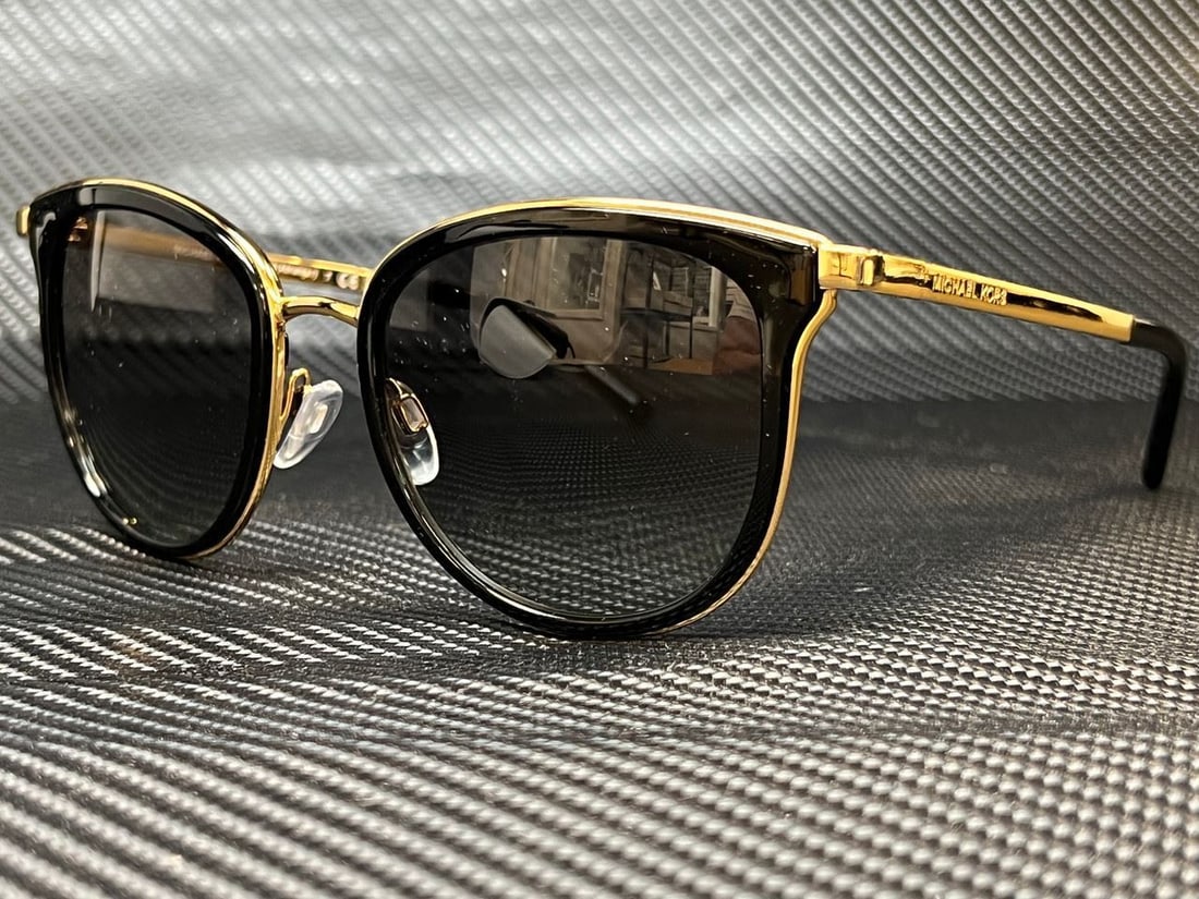 MICHAEL KORS MK1010 110011 Black/Gold Square 54 mm Womens Sunglasses: MICHAEL KORS MK1010 110011 Black/Gold Square 54 mm Womens Sunglasses Pattern: Solid Lens Technology: Gradient Mirrored Tinted Frame Color: Black Uv Protection: 100% UV Type: Sunglasses Lens Material: