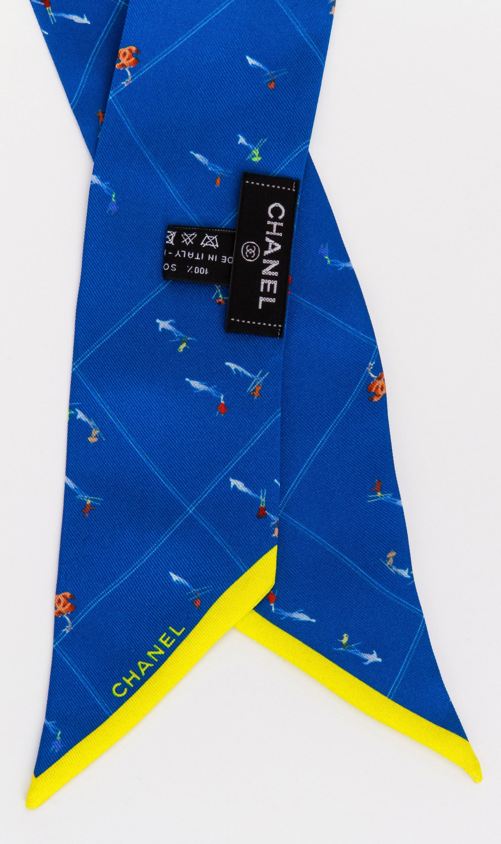 New Chanel Electric Blue Coco Skier Twilly Scarf: New Chanel Electric Blue Coco Skier Twilly Scarf Designer: Chanel Brand: Chanel Dimensions: Width: 2 in (5.08 cm)Length: 48 in (121.92 cm) Place of Origin: Italy Period: 21st Century New The Mynt Guar