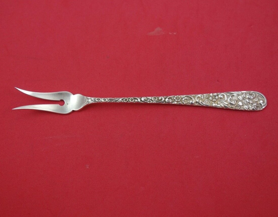 Repousse by Jenkins & Jenkins Sterling Silver Pickle Fork 2-Tine 6.5in: Repousse by Jenkins & Jenkins Sterling Silver Pickle Fork 2-Tine 6.5in This exquisite pickle fork features a 2-tine design and is made of sterling silver. Crafted by Jenkins & Jenkins, it showcases th