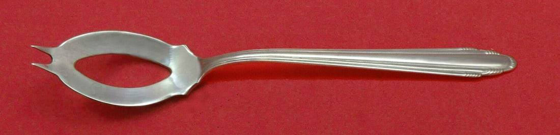 Contempora by Dominick & Haff Sterling Silver Olive Spoon 5.75in: Contempora by Dominick & Haff Sterling Silver Olive Spoon 5.75in This custom made Contempora olive spoon by Dominick & Haff is crafted from sterling silver. Measuring 5.75 inches, this serving spoon f