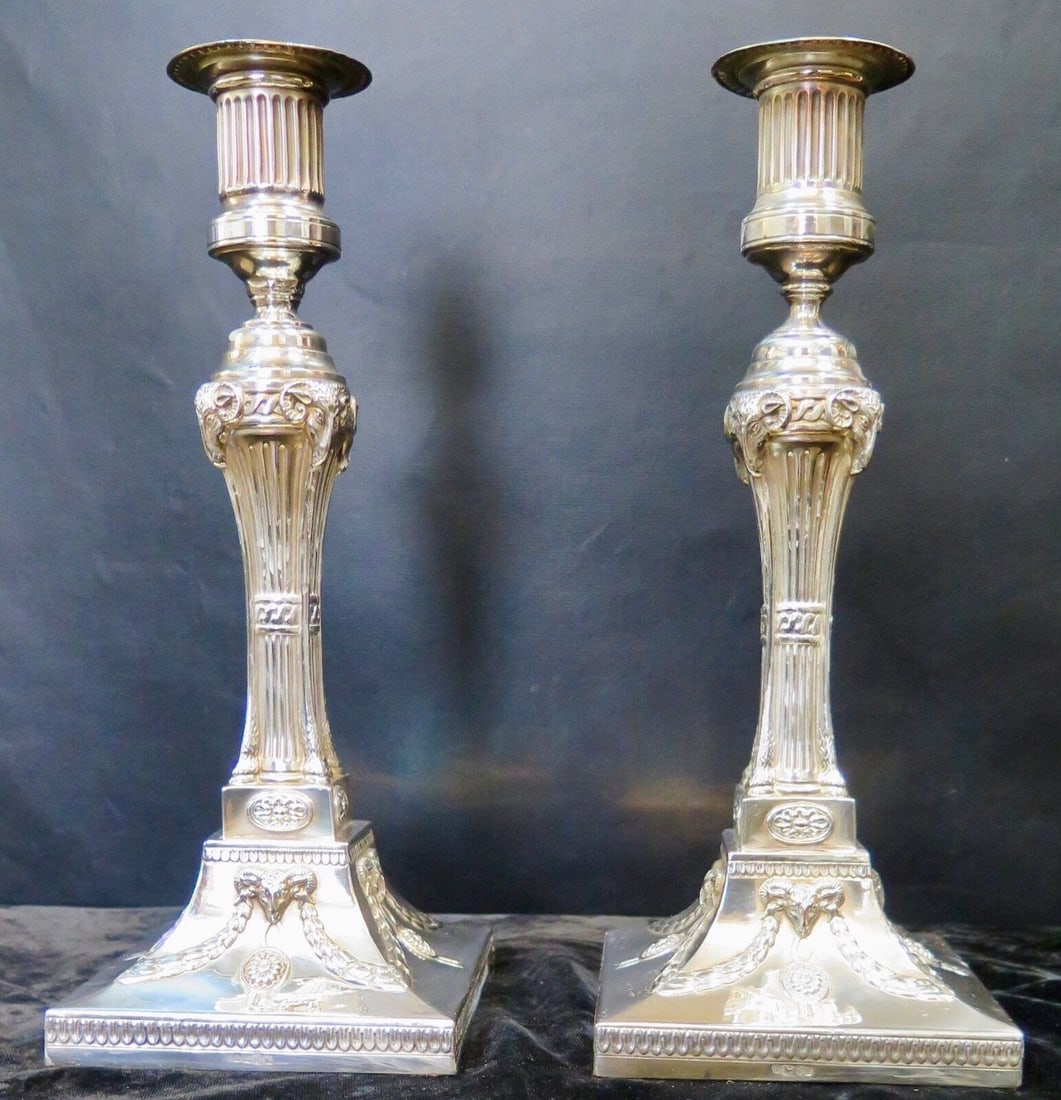 Vintage Sheffield Silverplate Candle Holders Early 20th Century: Vintage Sheffield Silverplate Candle Holders Early 20th Century This vintage early 20th century decorative silver plate candle holders are hallmarked Sheffield. They feature an elaborate design with r