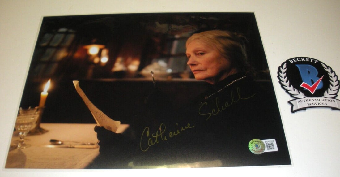Catherine Schell Signed 8x10 Photo James Bond Pink Panther Beckett COA: Catherine Schell Signed 8x10 Photo James Bond Pink Panther Beckett COA This is an original 8x10 photograph signed by Catherine Schell, known for her roles in James Bond and The Pink Panther. It comes
