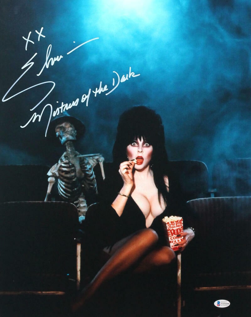 Cassandra Peterson Autographed 16x20 Elvira Photograph - Beckett Authenticated: Cassandra Peterson Autographed 16x20 Elvira Photograph - Beckett Authenticated This is an original 16x20 photograph of Elvira, signed by Cassandra Peterson. The autograph is authenticated by Beckett, 